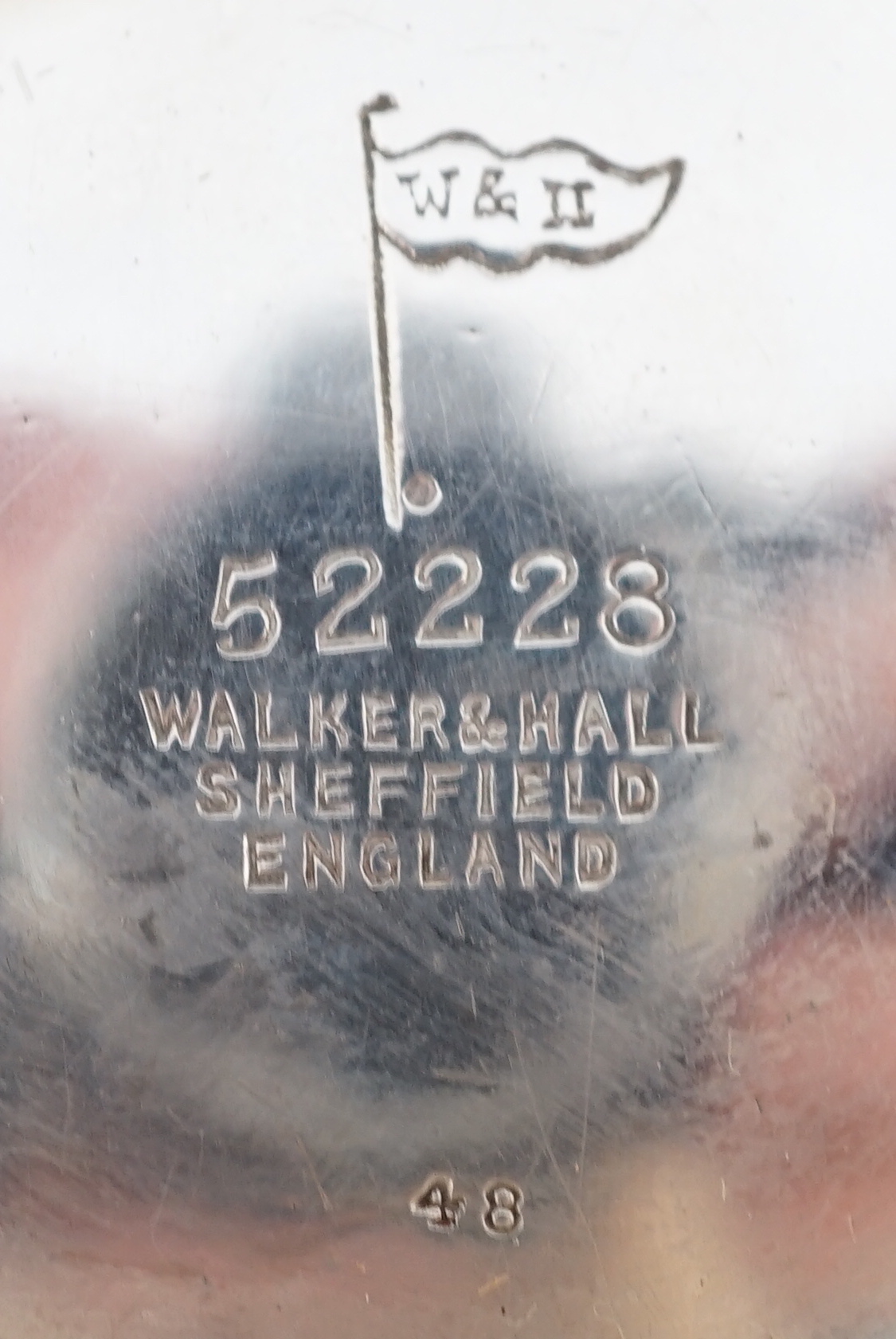 An Edwardian embossed silver rose bowl, by Walker & Hall